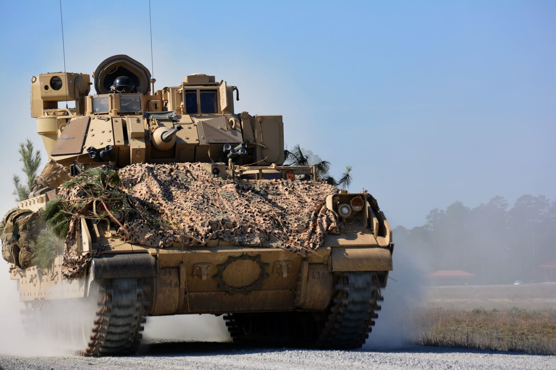 A M2A2 Bradley Fighting Vehicle from 1st Battalion, 64th Armor Regiment maneuvers during a company Combined Arms Live-Fire Exercise at Fort Stewart, Georgia Feb. 7, 2017.