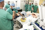 Medical personnel from William Beaumont Army Medical Center on Fort Bliss, Texas, prepare for treatment of a simulated postpartum hemorrhage using the center’s new simulation system, which provides cutting-edge scenarios for training to medical staff, March 29, 2018. The new simulation system aims to increase communication and improve interdisciplinary and clinical performance of staff when treating obstetrics emergencies.