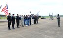 Eight recruits take the oath of enlistment, administered by Maj. Paul Lopez, Air Combat Command’s F-22 Demonstration Team pilot, during the 2018 Wings Over Columbus Air and Space Show April 21, 2018, on Columbus Air Force, Base, Mississippi. The recruits were positioned in front of the F-22 Raptor display, one of which took part in an aerial demonstration during the air show. (U.S. Air Force photo by Airman 1st Class Beaux Hebert)
