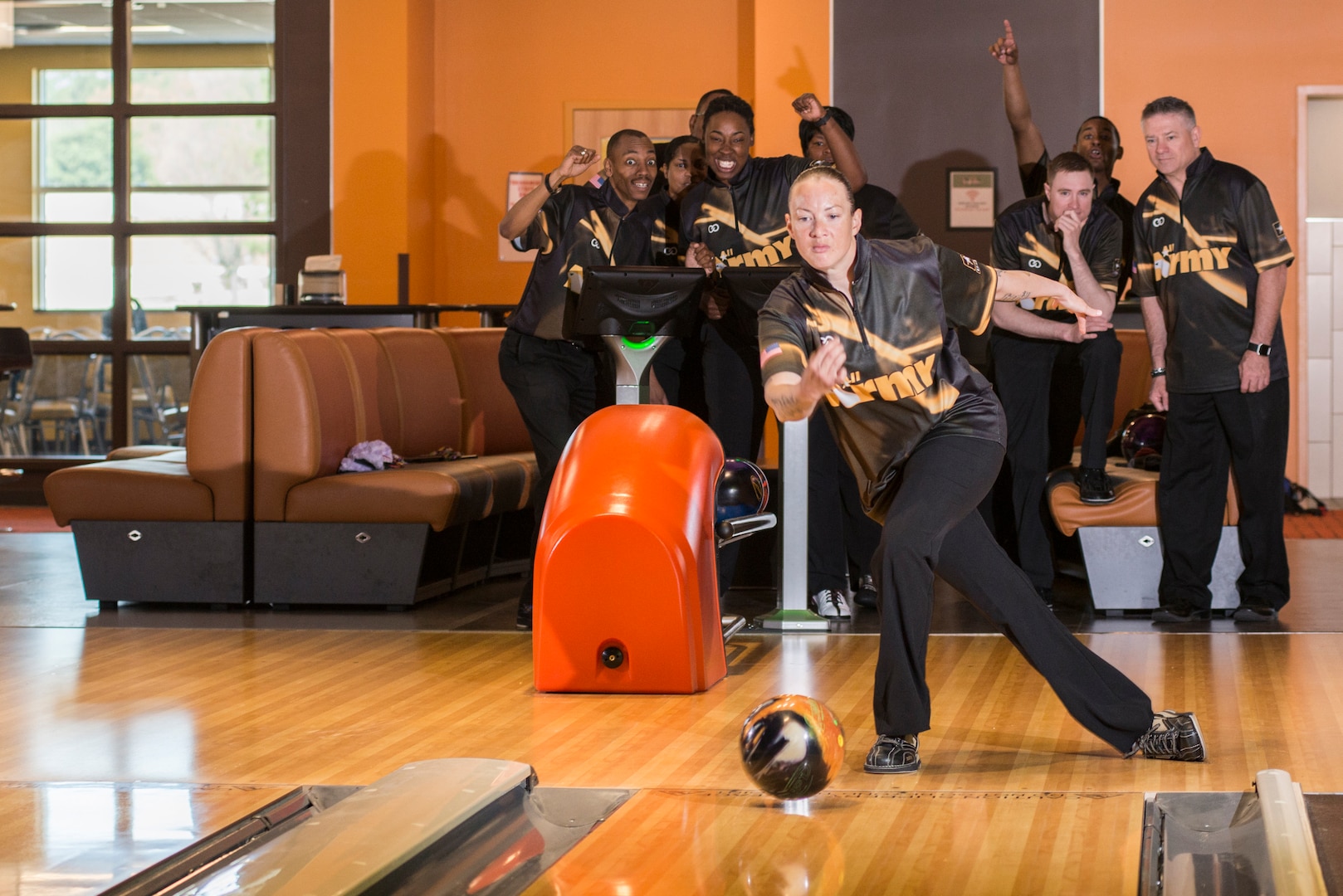 Army Staff Sgt. Rose Aguiliar of Fort Bliss, Texas wins gold in the 2018 Armed Forces Bowling Championship at Ten Strike Bowling Center at Fort Lee, Va. from 13-17 April. The annual tournament features doubles, mixed doubles, individuals and team challenges. (U.S. Navy Photo by Mass Communications Specialist 2nd Class Orlando Quintero/Released)