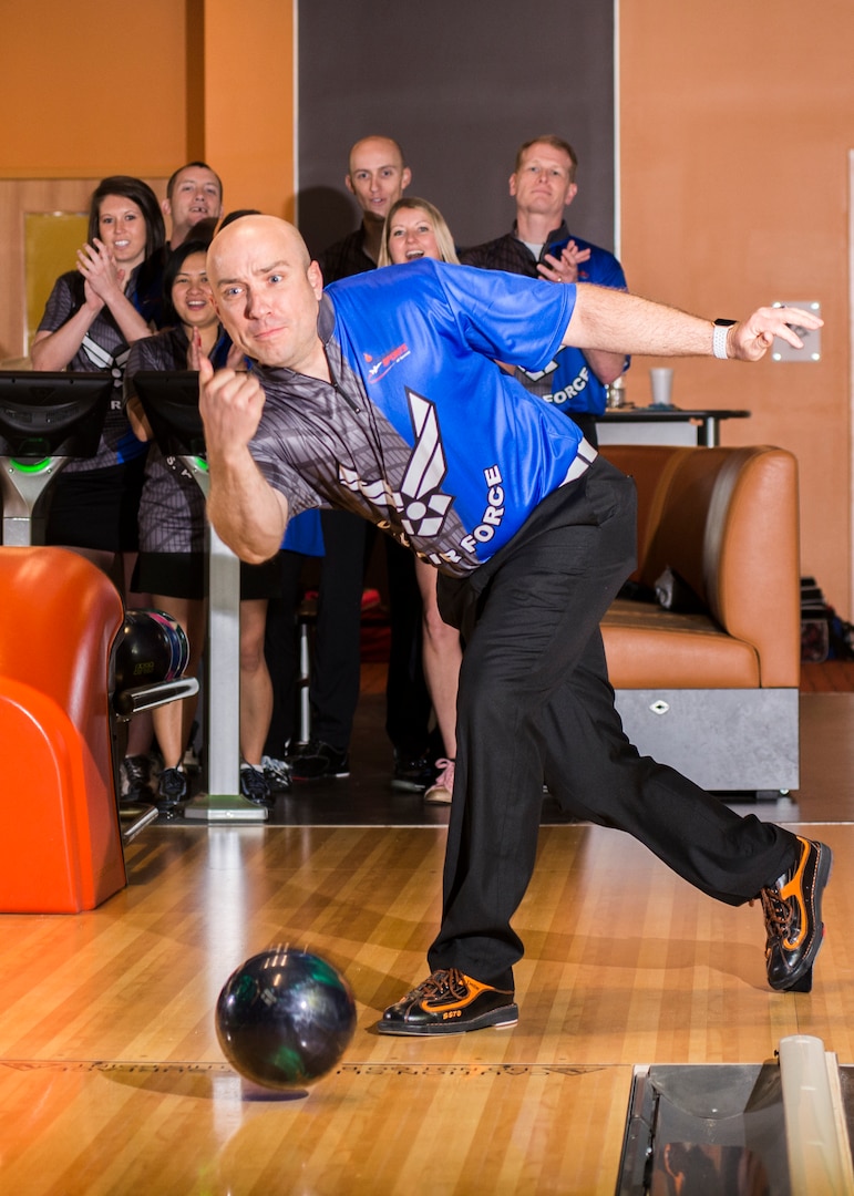 Air Force Staff Sgt. James McTaggart of Creech AFB, Nevada wins gold in the 2018 Armed Forces Bowling Championship at Ten Strike Bowling Center at Fort Lee, Va. from 13-17 April. The annual tournament features doubles, mixed doubles, individuals and team challenges. (U.S. Navy Photo by Mass Communications Specialist 2nd Class Orlando Quintero/Released)