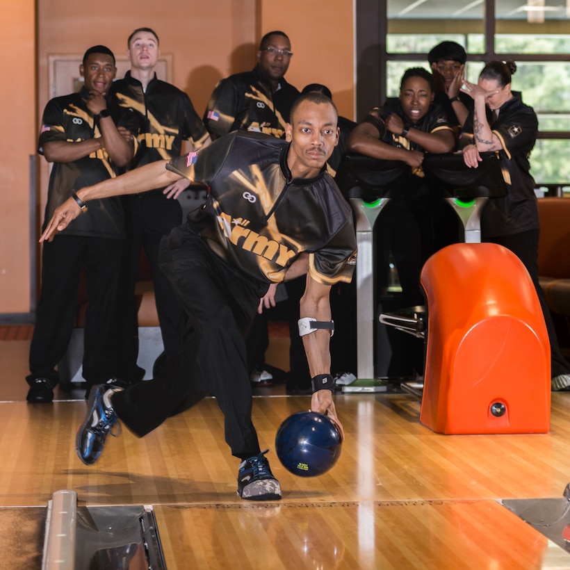 Army Staff Sgt. Allan Smith of Fort Hood, Texas wins silver in the 2018 Armed Forces Bowling Championship at Ten Strike Bowling Center at Fort Lee, Va. from 13-17 April. The annual tournament features doubles, mixed doubles, individuals and team challenges. (U.S. Navy Photo by Mass Communications Specialist 2nd Class Orlando Quintero/Released)