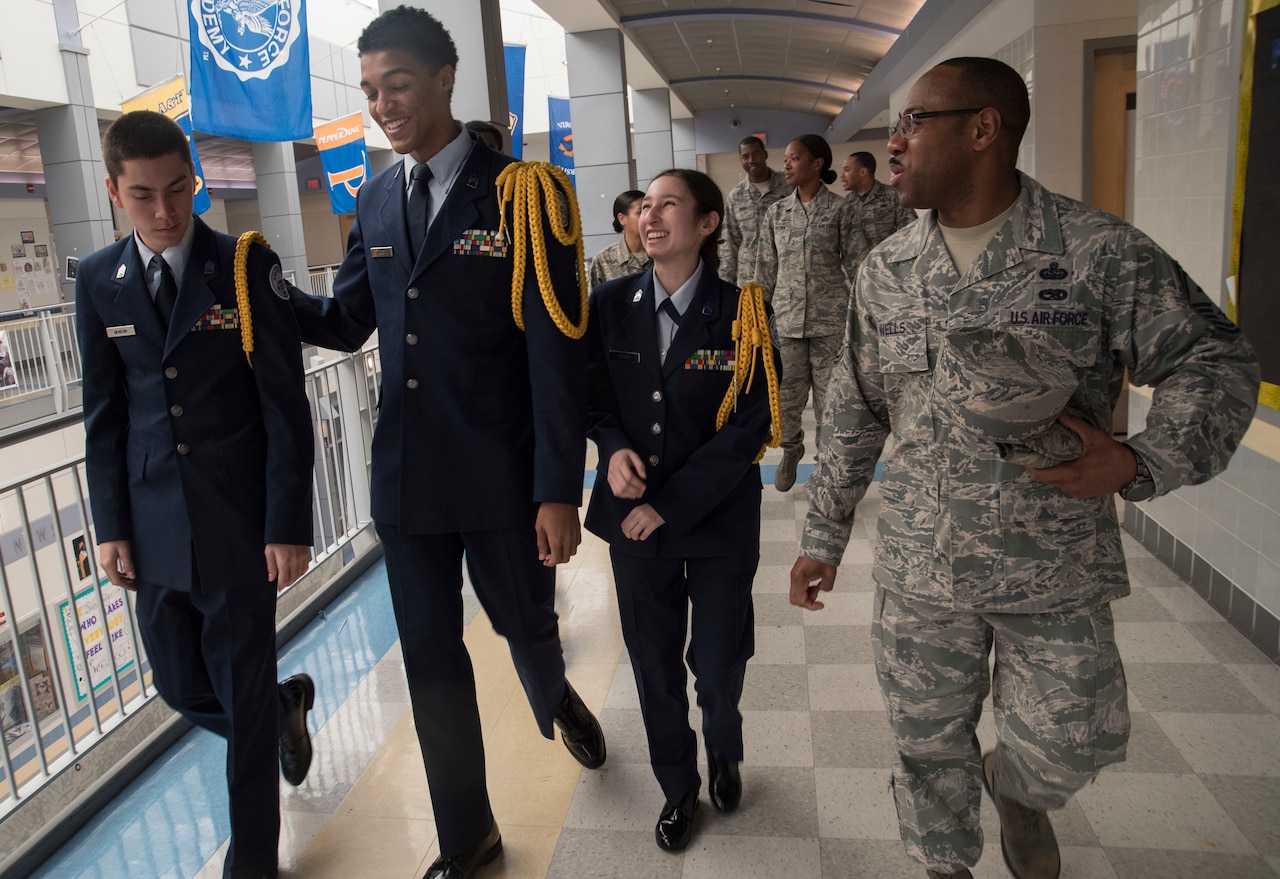 Melissa Cerna, center right, military child and Air Force Junior ROTC member, speaks with Joint Base Andrews first sergeants at Dr. Henry A. Wise Jr. High School in Upper Marlboro, Md.