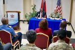 Adm. Kurt W. Tidd and Minister of National Security Edmund Dillon conduct a news conference