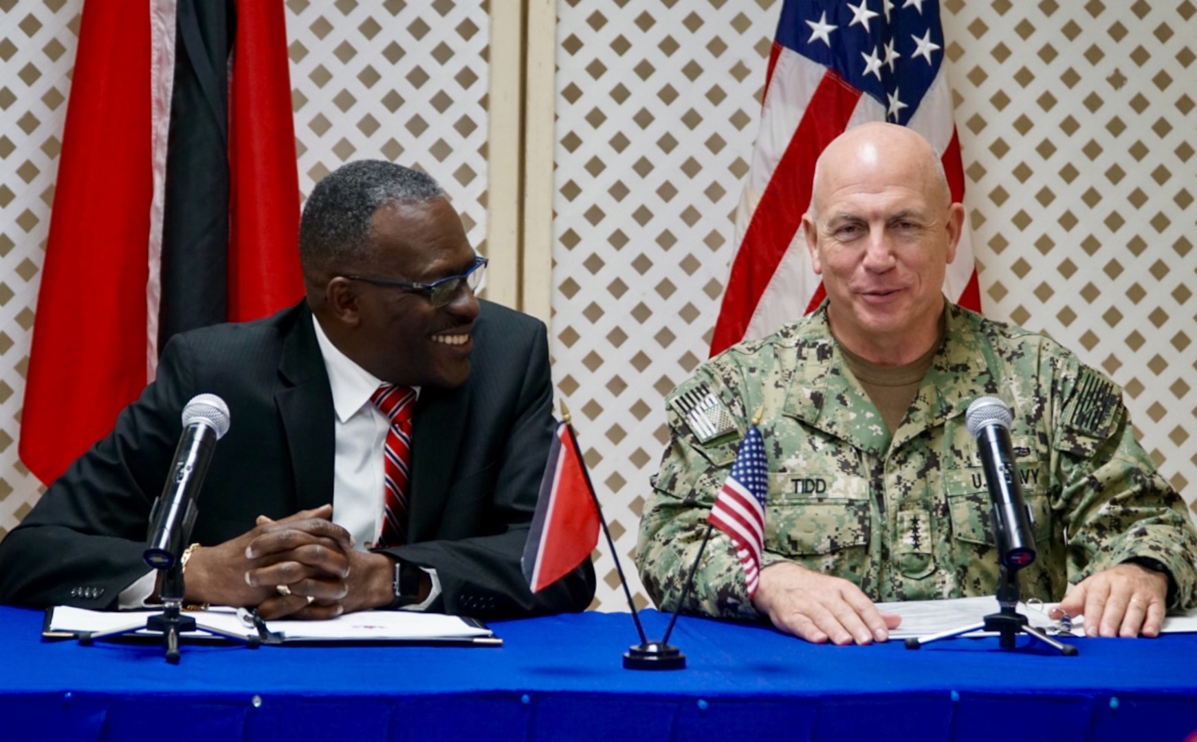 Adm. Kurt W. Tidd and Minister of National Security Edmund Dillon conduct a news conference.