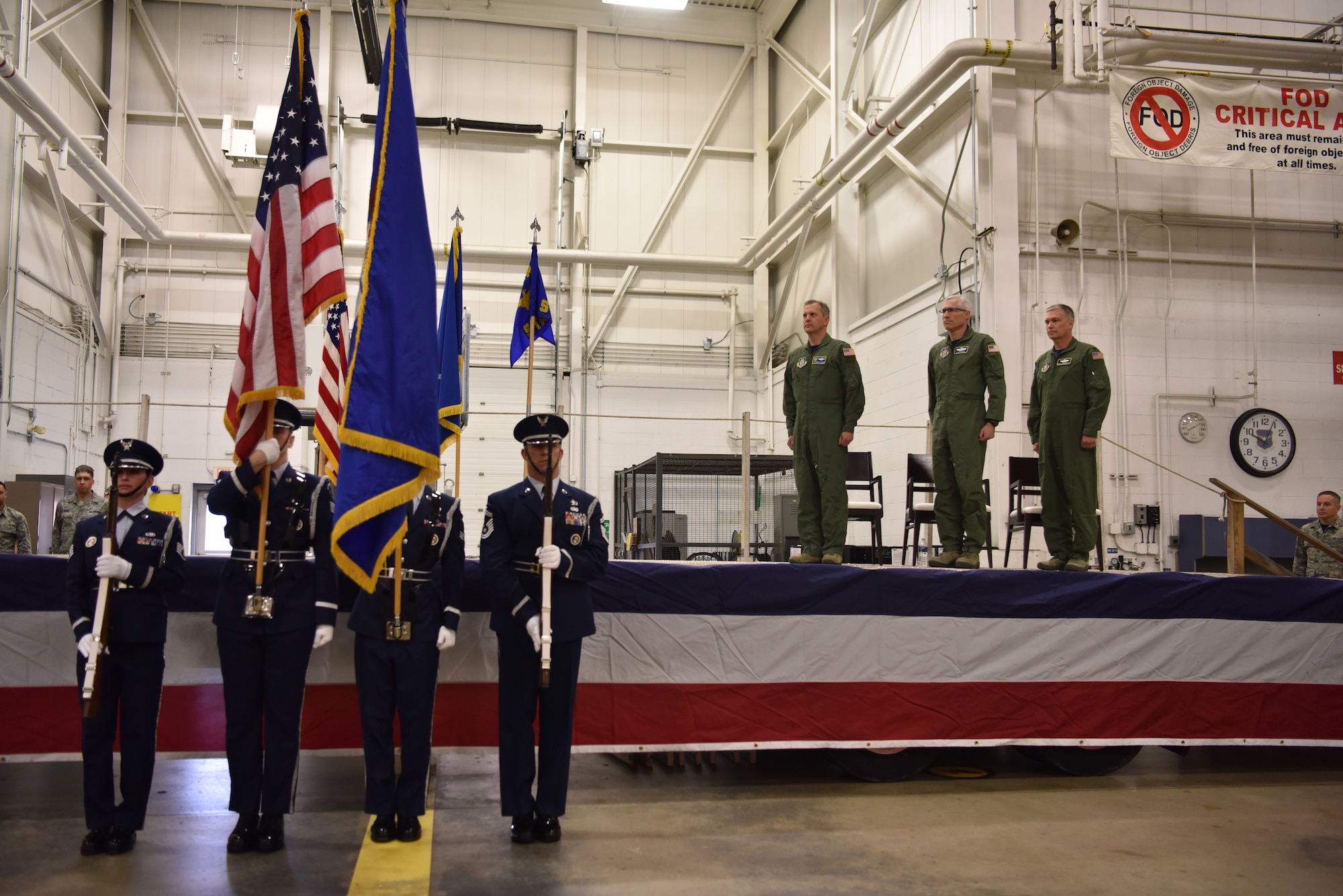 From left to right on stage, 4th Air Force Commander Maj. Gen. Randall A. Ogden, 22nd Air Force Commander Maj. Gen. Craig L. La Fave and 911th Airlift Wing Commander Col. Douglas N. Strawbridge stand at attention during the national anthem at the Pittsburgh International Airport Air Reserve Station, Pennsylvania, April 6, 2018. Two ceremonies were held to recognize the assumption of command for the wing as well as a change of Numbered Air Force. (U.S. Air Force photo by Staff Sgt. Marjorie A. Bowlden)
