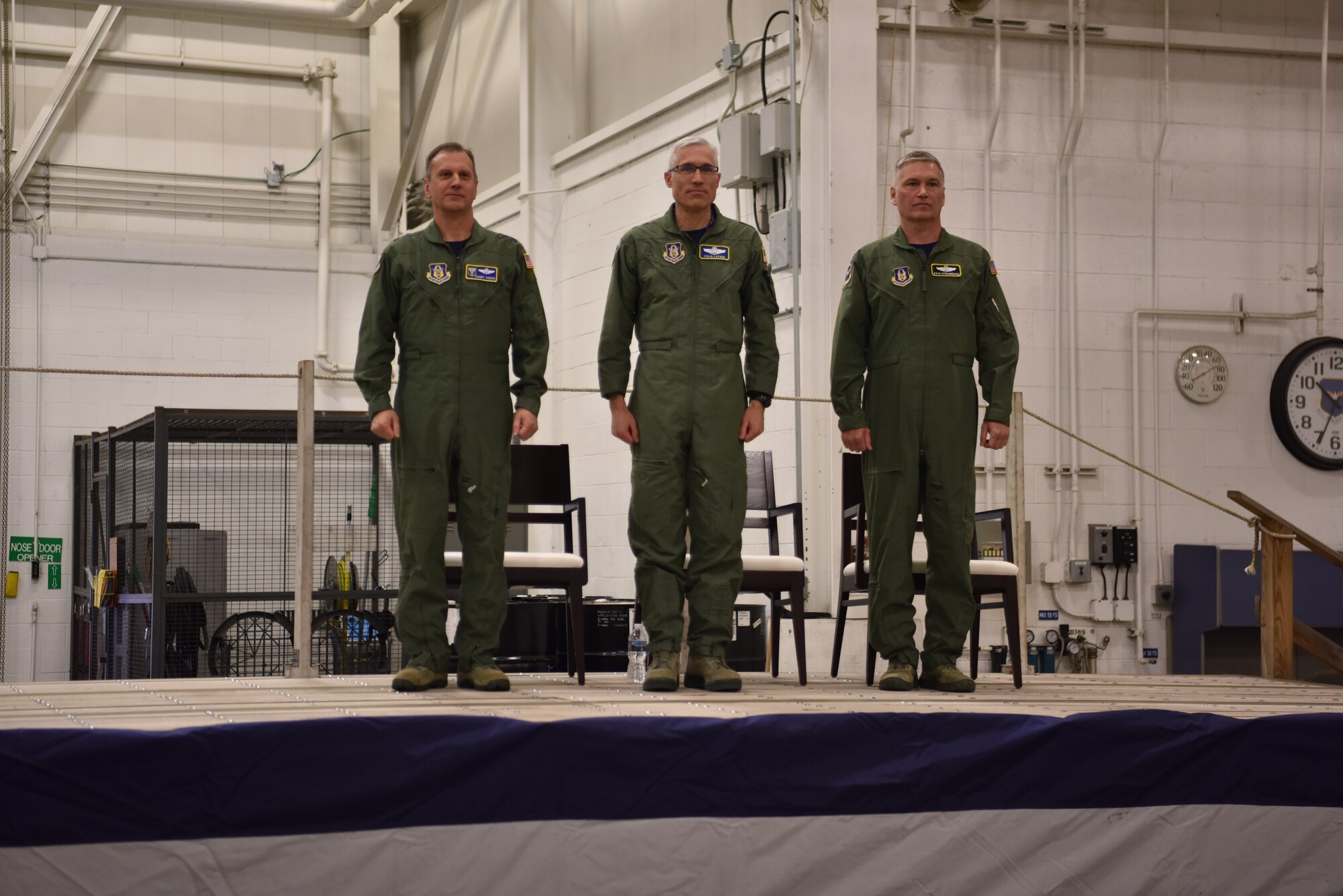 From left to right, 4th Air Force Commander Maj. Gen. Randall A. Ogden, 22nd Air Force Commander Maj. Gen. Craig L. La Fave and 911th Airlift Wing Commander Col. Douglas N. Strawbridge stand at attention at Pittsburgh International Airport Air Reserve Station, Pennsylvania, April 6, 2018. Two ceremonies were held to recognize the assumption of command for the wing as well as a change of Numbered Air Force. (U.S. Air Force photo by Staff Sgt. Marjorie A. Bowlden)