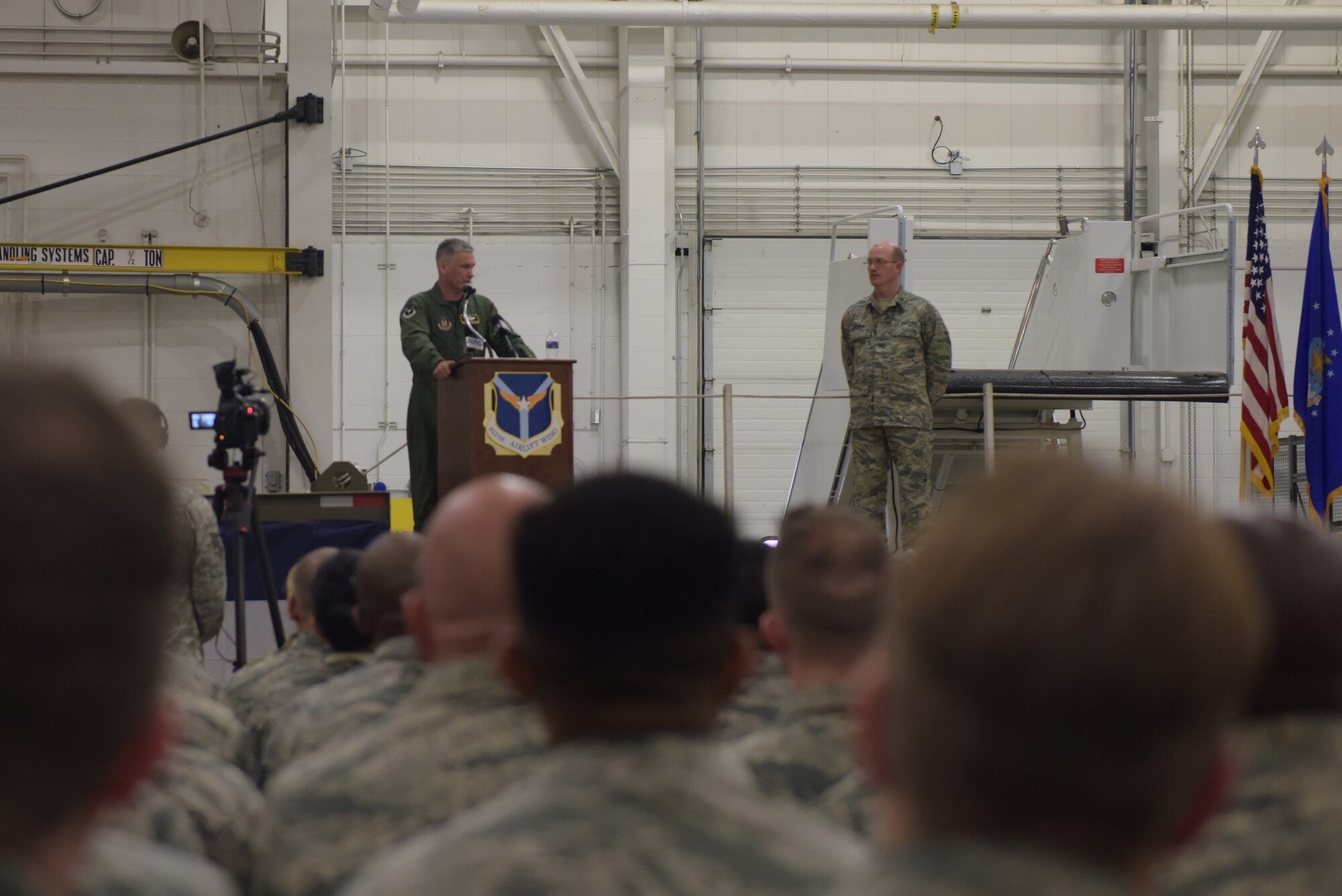 Col. Douglas N. Strawbridge, 911th Airlift Wing commander, gives a speech during an assumption of command ceremony at the Pittsburgh International Airport Air Reserve Station, Pennsylvania, April 6, 2018. Strawbridge will lead the wing through a period of change as it converts its mission capabilities from the C-130 Hercules aircraft to the C-17 Globemaster III. (U.S. Air Force photo by Airman 1st Class Grace Thomson)