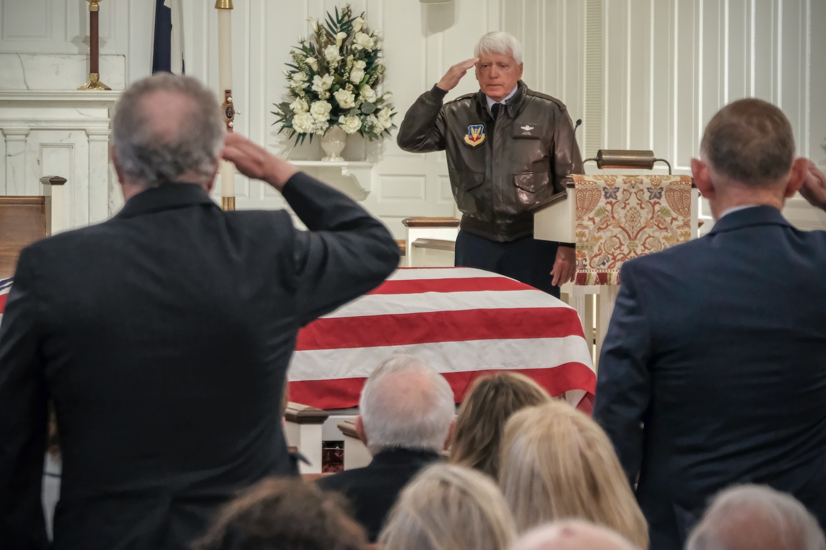 USAF Col. (retired) Edward Sykes leads a “brothers salute” during a funeral service held for Air Force Reserve 1st Lt. David T. Dinan, III, on April 25, 2018 at Arlington National Cemetery. Lt. Dinan was shot down and lost in Laos in 1969. DPAA accounted for Lt. Dinan on Aug. 7, 2017 after conducting several investigation missions that led to the recovery of his remains. (DPAA photo by Mr. Lee O. Tucker)