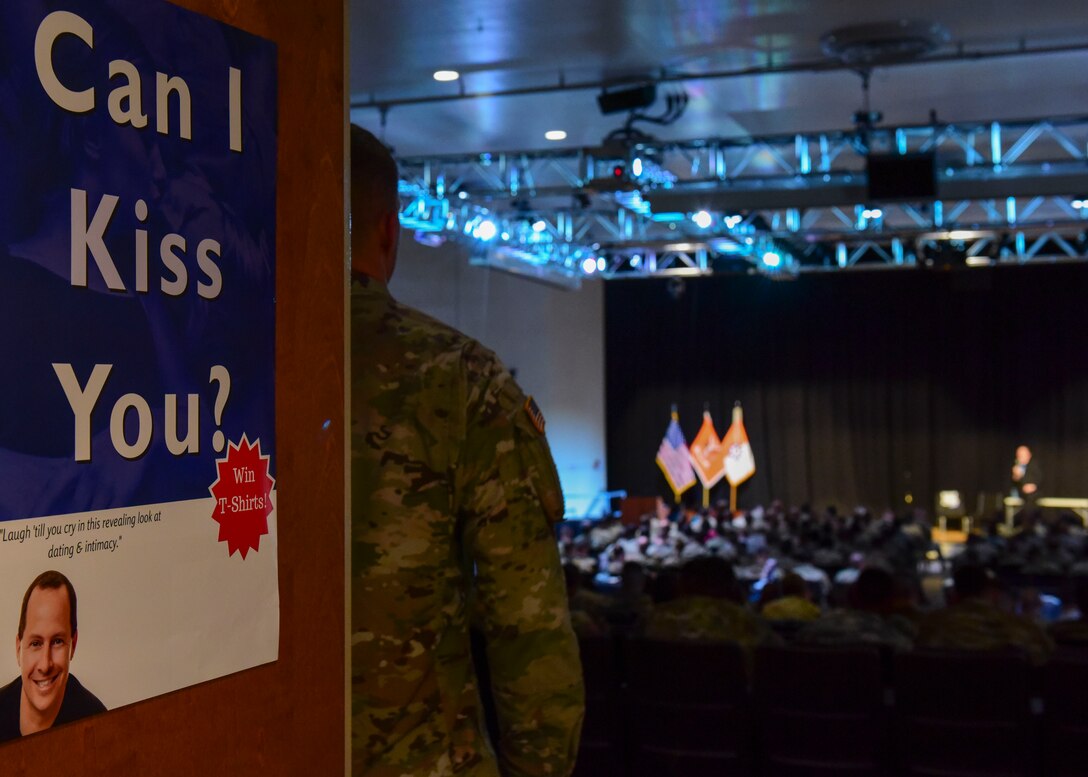 A U.S. Army Soldier watches a Sexual Harassment/Assault Response and Prevention presentation given by Mike Domitrz in Fort Eustis’ Jacobs Conference Center at Joint Base Langley-Eustis, Virginia, April 25, 2018. Domitrz engaged Soldiers through humor and personal anecdotes during his one-man show titled, “Can I Kiss You?” (U.S. Air Force photo by Airman 1st Class Monica Roybal)