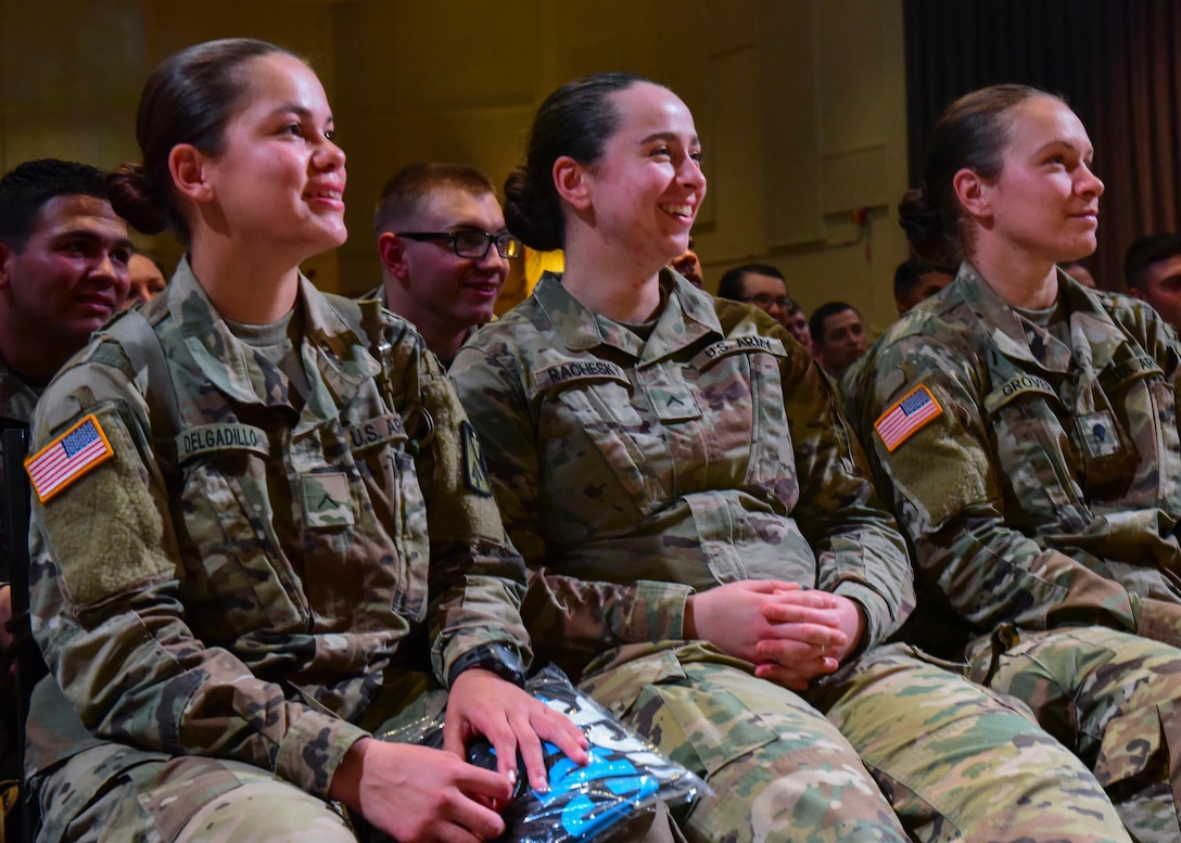 U.S. Army Soldiers laugh during a presentation in Fort Eustis’ Jacobs Conference Center at Joint Base Langley-Eustis, Virginia, April 25, 2018. Soldiers attended an unconventional Sexual Harassment/Assault Response and Prevention Program training that used humor to connect with Soldiers. (U.S. Air Force photo by Airman 1st Class Monica Roybal)