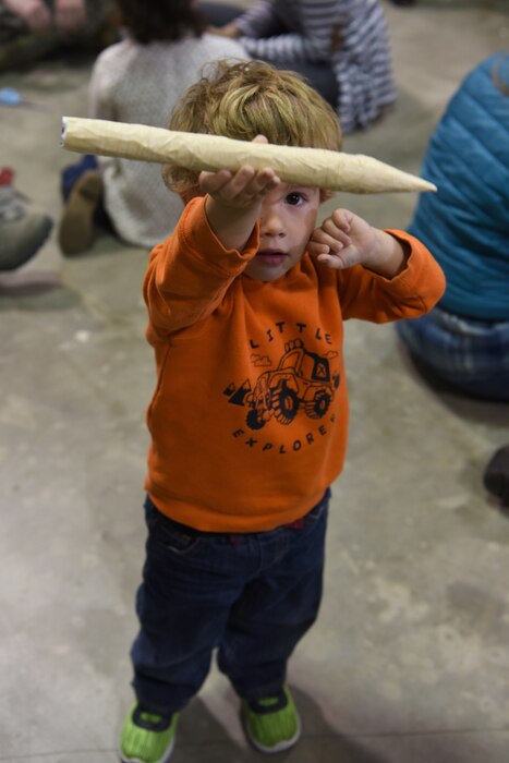 Wyatt Wunn, son of Staff Sgt. Brandon Wunn, 614th Air and Space Operations Center offensive duty operator, builds a model rocket at the Space and Missile Technology Center during Bring Your Child to Work Day April 26, 2018, Vandenberg Air Force Base, Calif. The event was established to underscore the important role children play in the Armed Forces community. (U.S. Air Force photo by Airman Aubree Milks/Released)