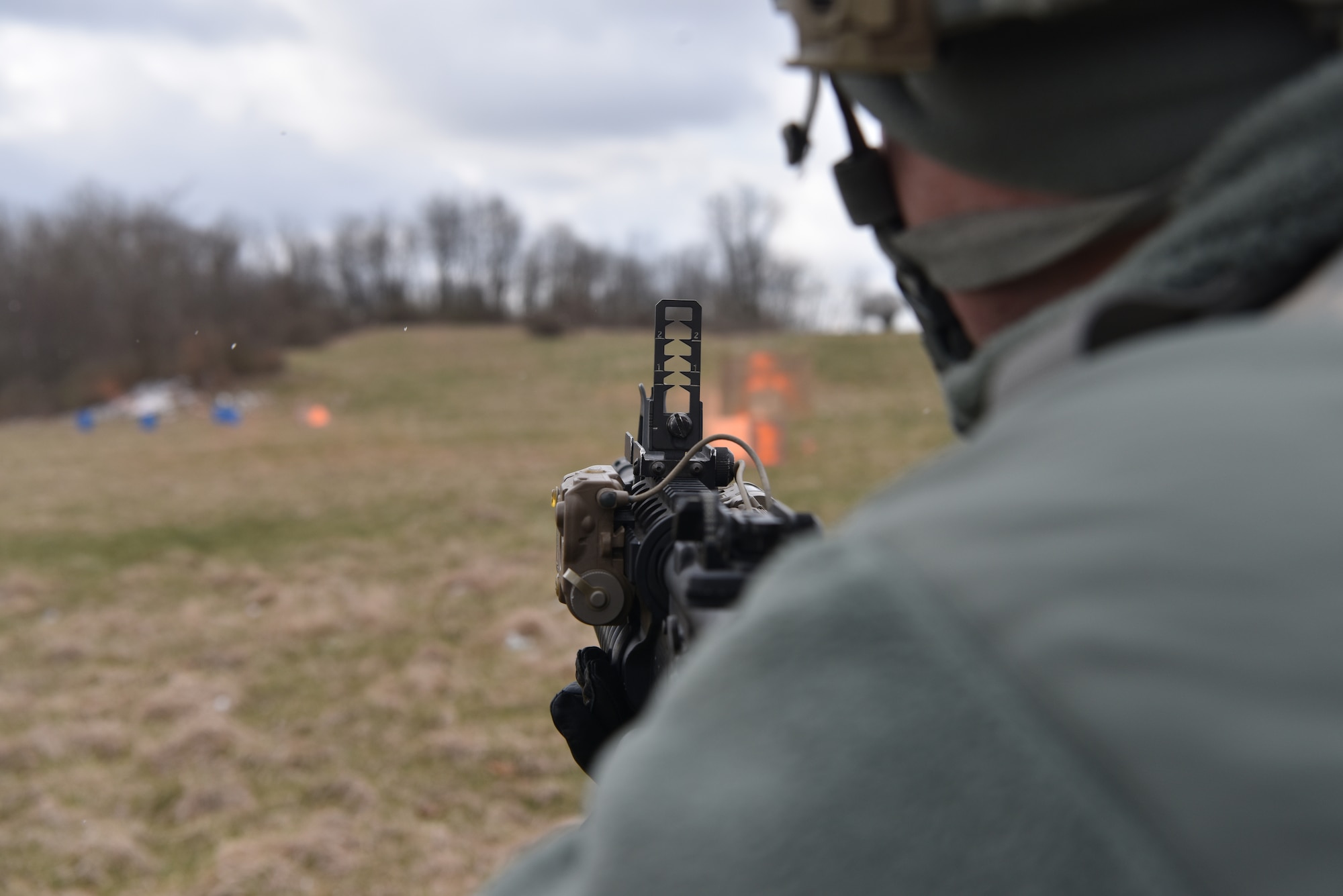Staff Sgt. Caleb Baumcratz, fire team leader with 911th Security Forces Squadron, aims his weapon downrange during M203 grenade launcher training in Burgettstown, Pennsylvania, April 8, 2018. The M203 is a single shot 40mm grenade launcher designed to attach to an M-4 Weapon system. (U.S. Air Force photo by Staff Sgt. Marjorie Bowlden)