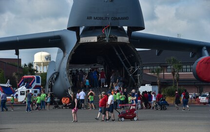 Attendees of the 2018 Air and Space Expo rehearsal tour a C-5 Galaxy at Joint Base Charleston, S.C., April 27, 2018.