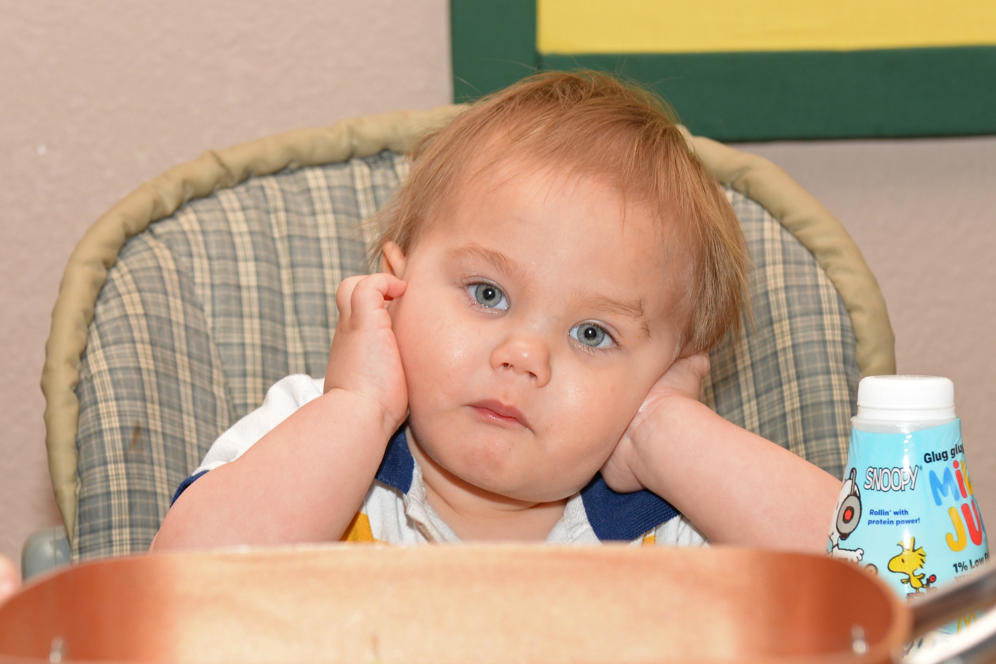 Lucas, a child of Tech. Sgt. Brian, the 28th Civil Engineer Squadron noncommissioned officer in charge of power production, and Tech. Sgt. Leah Thomas, noncommissioned officer in charge of Quality Assurance, Aircrew Flight Equipment, waits for his dinner in Box Elder, S.D., April 19, 2018. The Thomas’ perform more than 50 hours of training each year to keep their certifications valid compared to the five-hour minimum to be foster parent in 14 states. (U.S. Air Force photo by Airman 1st Class Nicolas Z. Erwin)