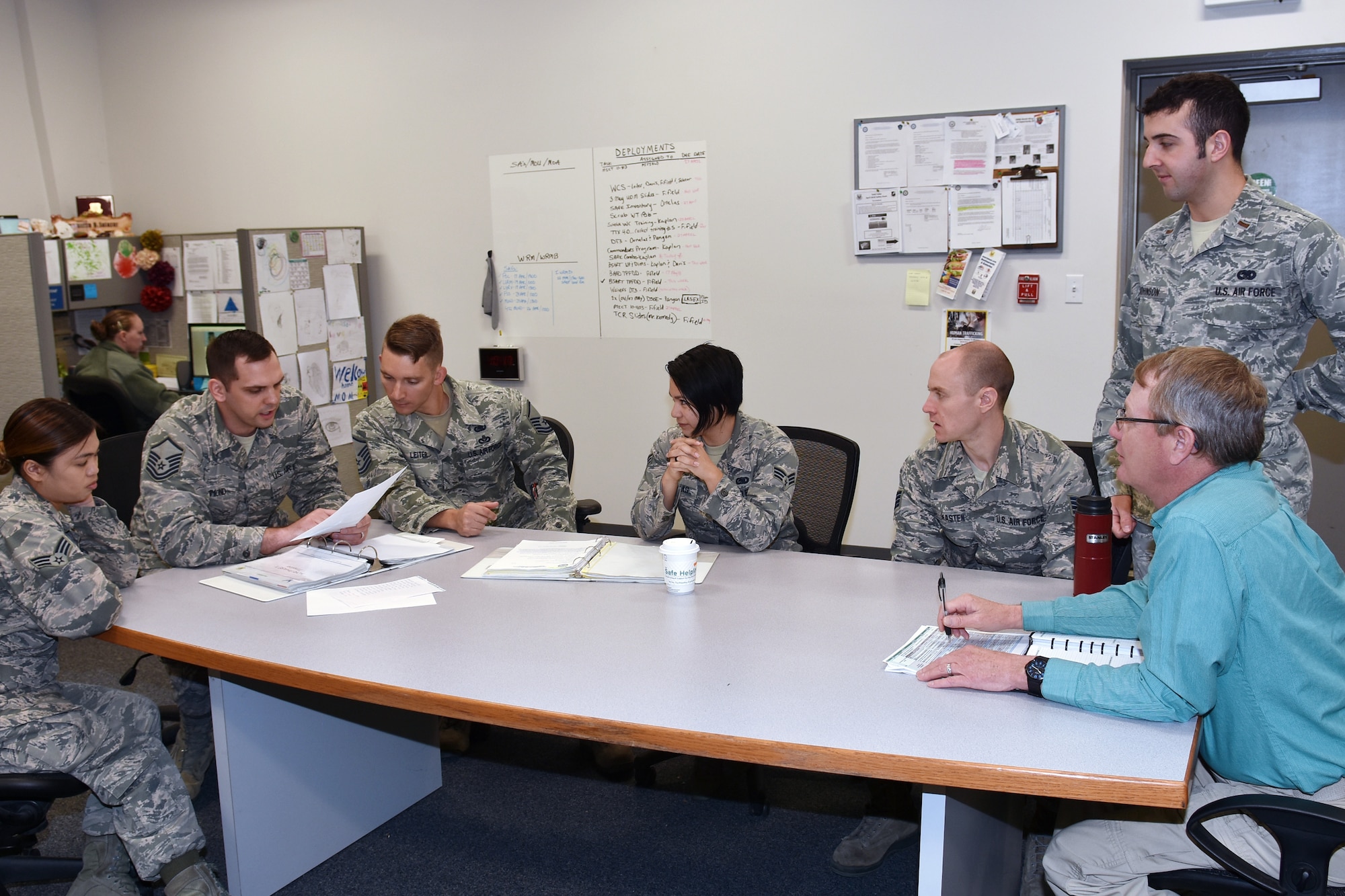 Members of the 509th and 131st Logistics Readiness Squadrons discuss mission planning objectives at Whiteman Air Force Base, Mo., April 25, 2018. Capitalizing on the strengths of the active duty and the Air National Guard keeps the total force team competitive for honors such as the Maj. Gen. Warren R. Carter Logistics Readiness Award. (U.S. Air National Guard photo by Senior Master Sgt. Mary-Dale Amison)