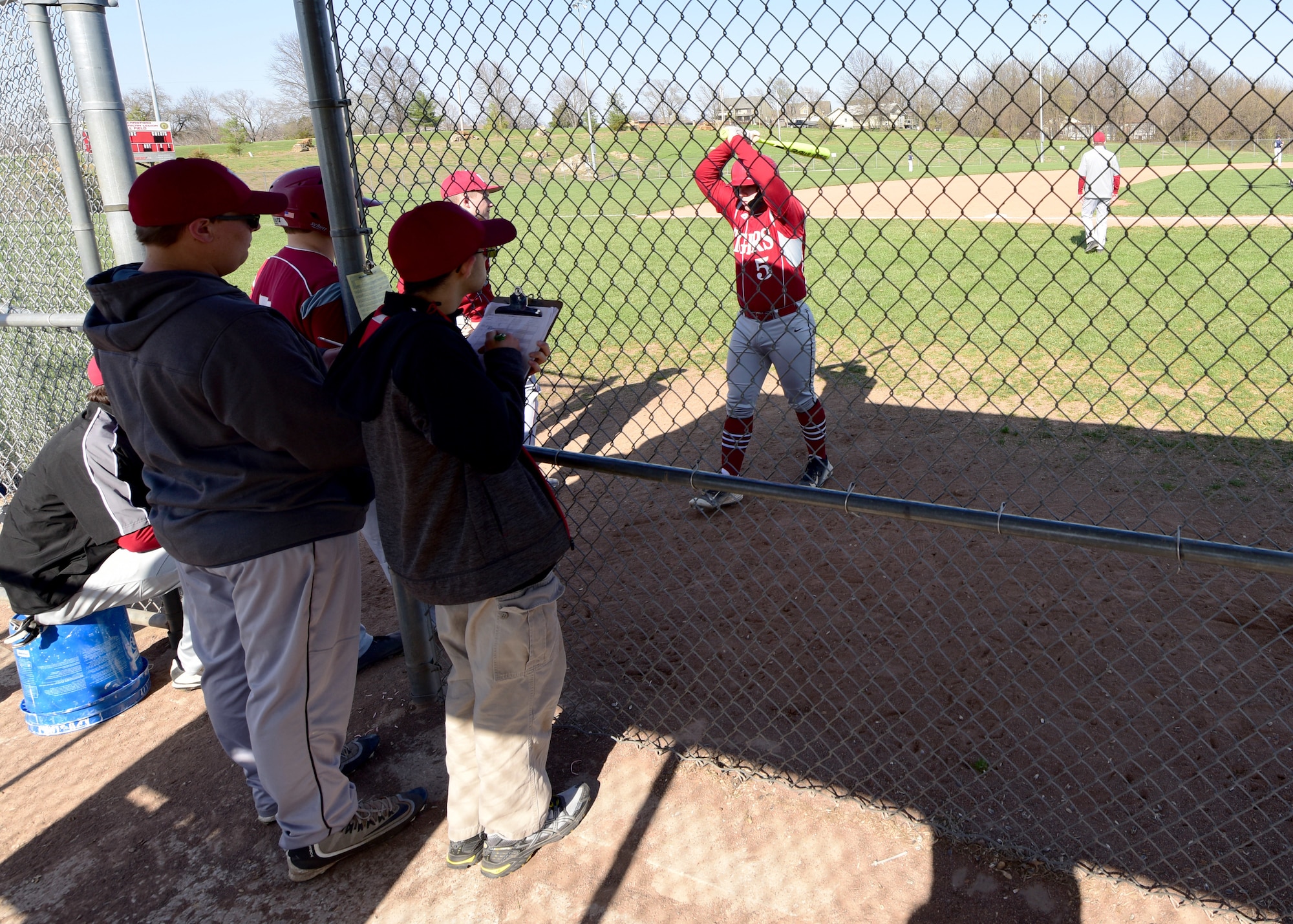 Andy Martins, a manager for the Warrensburg High School baseball team, watches the game at West Park in Warrensburg, Mo., April 16, 2018. Ever since he was 6 years old, Andy has been involved in sports, which has helped him with his autism. (U.S. Air Force photo by Staff Sgt. Danielle Quilla)