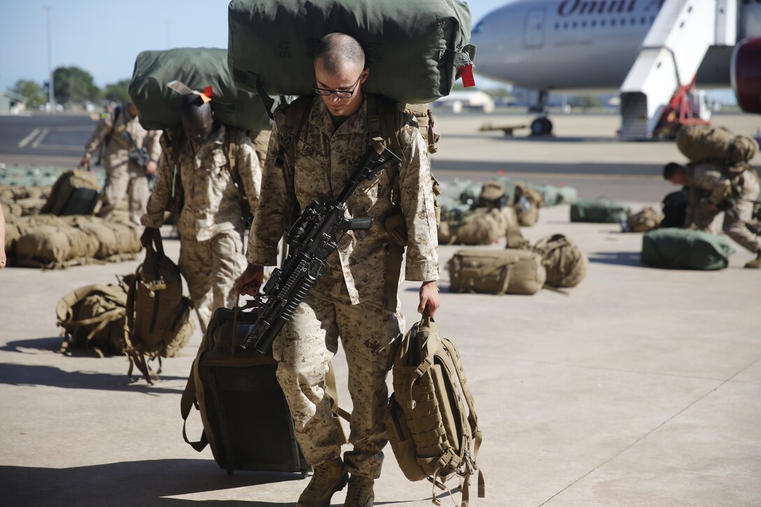 U.S. Marines and Sailors with Marine Rotational Force – Darwin 2018 collect their luggage and proceed to customs after arriving at the Royal Australian Air Force Base Darwin, Australia, April 17. MRF-D is a six month rotational deployment to Australia of 1,500 U.S. Marines and Sailors who make up a Marine Air-Ground Task Force to conduct exercises and training with the Australian Defence Force. MRF-D is the most visible and immediate symbol of the U.S. Australia alliance (U.S. Marine Corps photo by Sgt. Rivera, Kayla D./Released).