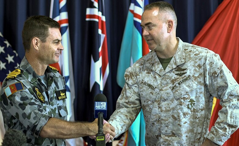 U.S. Marine Corps Col. James Schnelle, commanding officer of Marine Rotational Force-Darwin and Deputy Commander Northern Command CAPT Bryan Parker, Royal Australian Navy hold a press conference at Larrakeyah Defence Precinct, Darwin, Northern Territory, Australia, April 23,