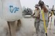 Dry concrete transported by a telehandler is placed into a crater on a mock damaged airfield at Al Udeid Air Base, Qatar on April 25, 2018. The machinery is part of an arsenal of new equipment civil engineers use for backfilling and capping craters as part of Rapid Airfield Damage Recovery (RADR). Civil engineers can now guarantee repairs to full operational capability in a matter of hours. This is also the first time RADR has been utilized in AFCENT. (U.S. Air Force photo by Tech. Sgt. Arthur Mondale Wright)