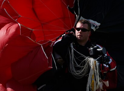 U.S. Army Sgt. 1st Curt Loter, U.S. Army Special Operations Command Parachute Demonstration Team, known as the “Black Daggers,” completes a practice jump as part of a 2018 Air and Space Expo rehearsal April 27, 2018, at Joint Base Charleston, S.C.