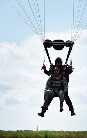 U.S. Army Sgt. 1st Class Sean O’Toole, U.S. Army Special Operations Command Parachute Demonstration Team, known as the “Black Daggers,” performs a practice tandem jump with U.S. Air Force Senior Airman Keyren King, 628th Communications Squadron,  as part of a 2018 Air and Space Expo rehearsal April 27, 2018, at Joint Base Charleston, S.C.