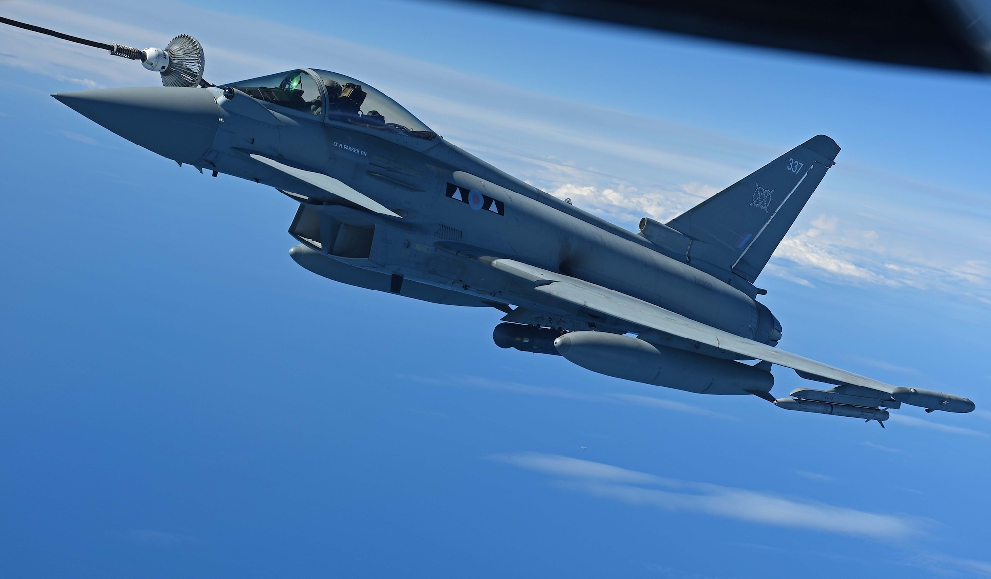 A Royal Air Force Typhoon receives fuel from a U.S. Air Force KC-135 Stratotanker during the U.K.-led Exercise Joint Warrior over England, April 25, 2018. The KC-135 offloaded more than 7,000 pounds of fuel in support of the exercise that involved U.K., NATO and allied units. (U.S. Air Force photo by Senior Airman Luke Milano)