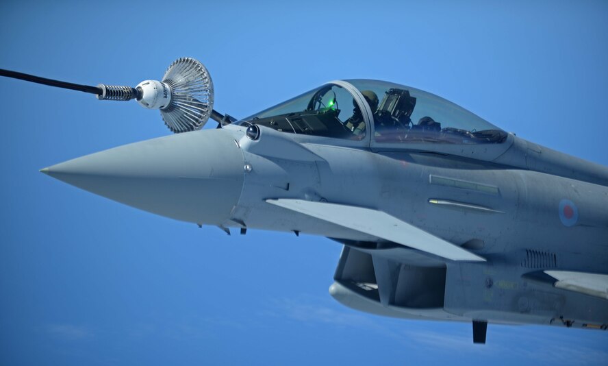 A Royal Air Force Typhoon receives fuel from a U.S. Air Force KC-135 Stratotanker during the U.K.-led Exercise Joint Warrior over England, April 25, 2018. The KC-135 offloaded more than 7,000 pounds of fuel in support of the exercise that involved U.K., NATO and allied units. (U.S. Air Force photo by Senior Airman Luke Milano)