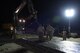 airmen smooth out wet cement