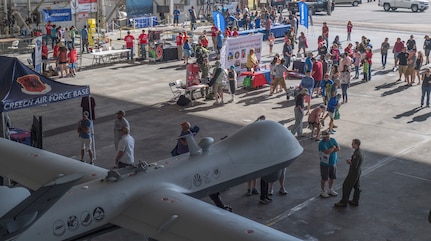 Attendees visit multiple exibits during the Joint Base Charleston Air and Space Expo at JB Charleston, S.C.  Apr 28, 2018.