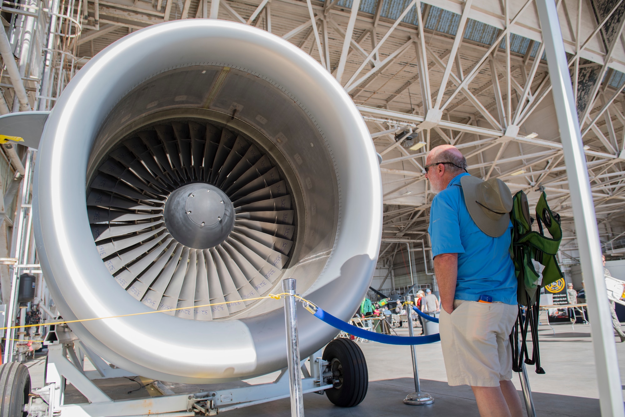 An attendee looks at an aerospace propulsion exhibit during the Joint Base Charleston Air and Space Expo at JB Charleston, S.C.  Apr 28, 2018.