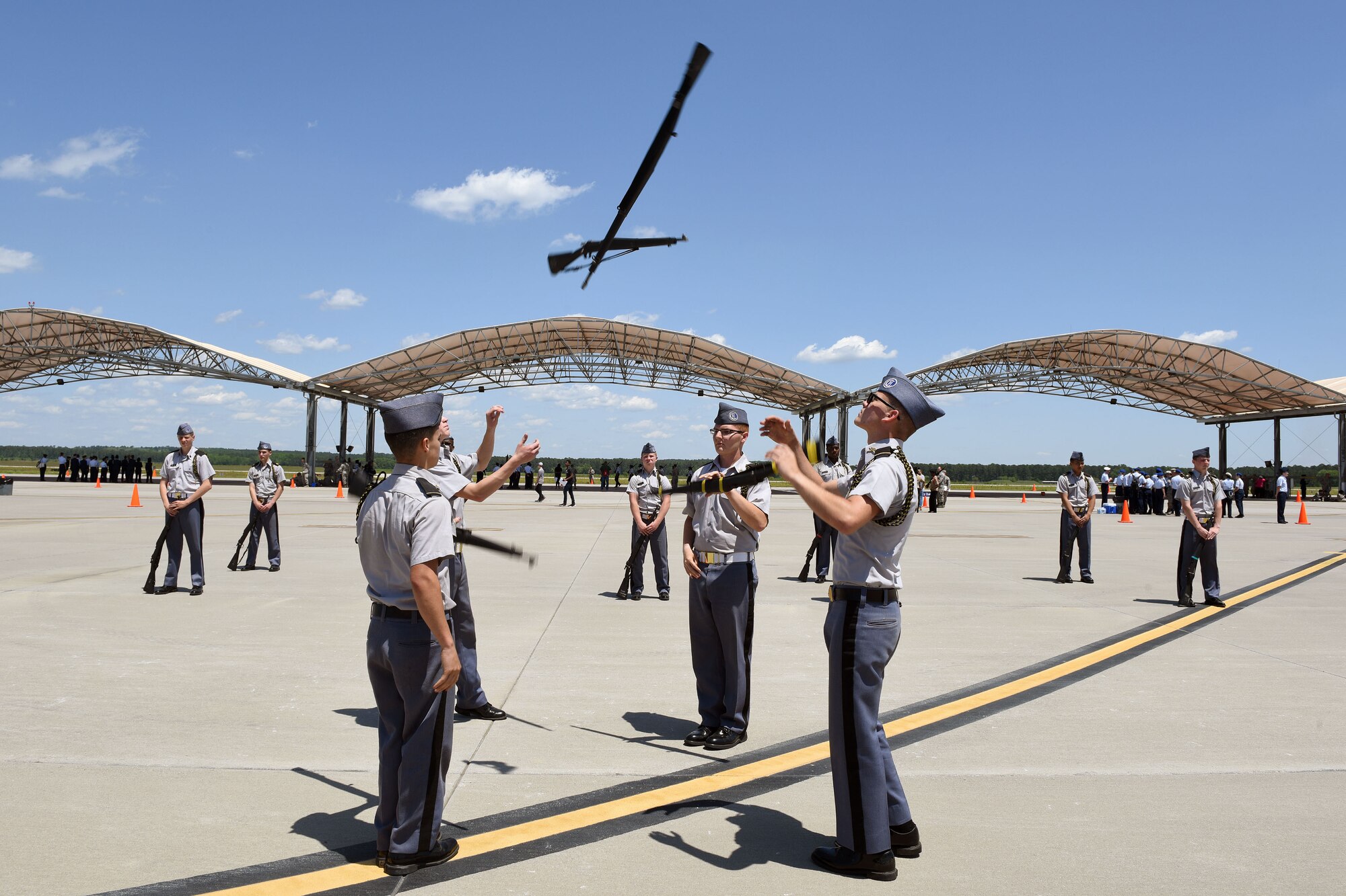 Camden Military Academy junior ROTC cadets perform their Fancy Platoon Armed drill and ceremony event during the annual Top Gun Drill Meet at McEntire Joint National Guard Base, S.C., April 28, 2018. High School junior ROTC cadets from across the state competed in drill and ceremony events sponsored by the South Carolina Air National Guard.