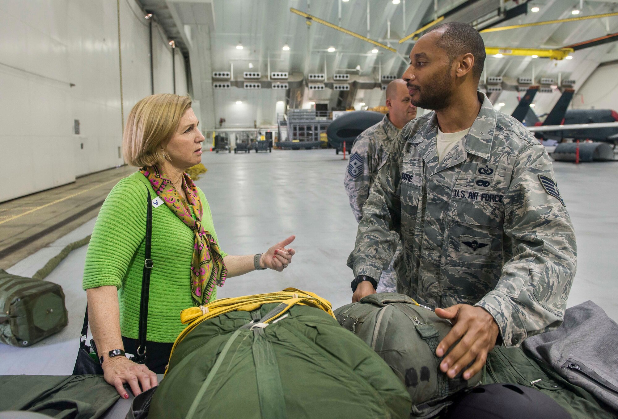 Ms. Pam Younker, an Air Force civic leader, listens to a briefing in a hangar on Andersen Air Force, Guam, April 28, 2018, during a weeklong civic leader trip several bases throughout the Indo-Pacific region. Air Force civic leaders are unpaid advisers, key communicators and advocates for the Air Force. (U.S. Air Force photo by Airman 1st Christopher Quail)
