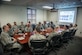 Leadership from the 36th Medical Group squadron briefs U.S. Air Force Lt. Gen Mark A. Ediger, Surgeon General of the Air Force, during his visit April 17, 2018, to Andersen Air Force Base, Guam. Leadership discuss some of the unique aspects of running a medical squadron on an island distant away. (U.S. Air Force Photo by Airman 1st Class Christopher Quail)