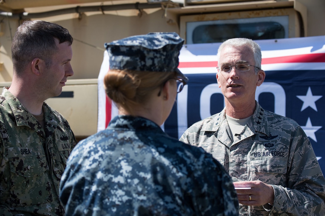 The vice chairman of the joint chiefs of staff talks to sailors.