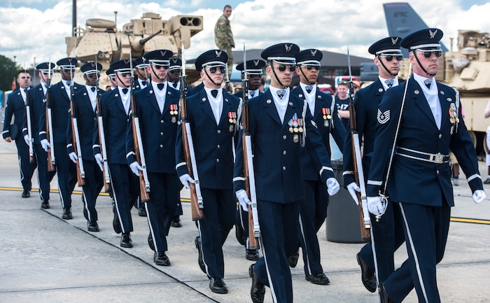 Members of the United States Air Force Honor Guard Drill Team perform during the 2018 Air and Space Expo at Joint Base Charleston, S.C. April 28, 2018.