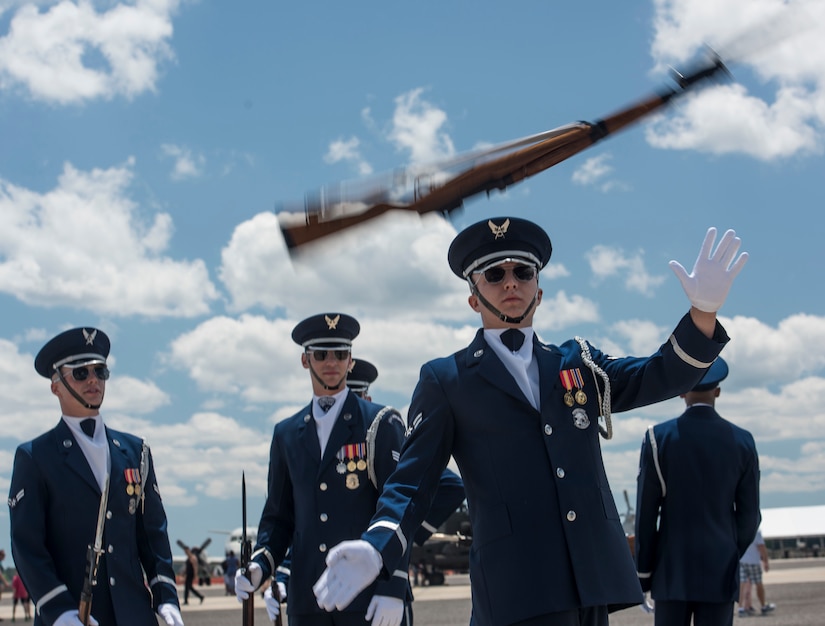 Members of the United States Air Force Honor Guard Drill Team perform during the 2018 Air and Space Expo at Joint Base Charleston, S.C. April 28, 2018.