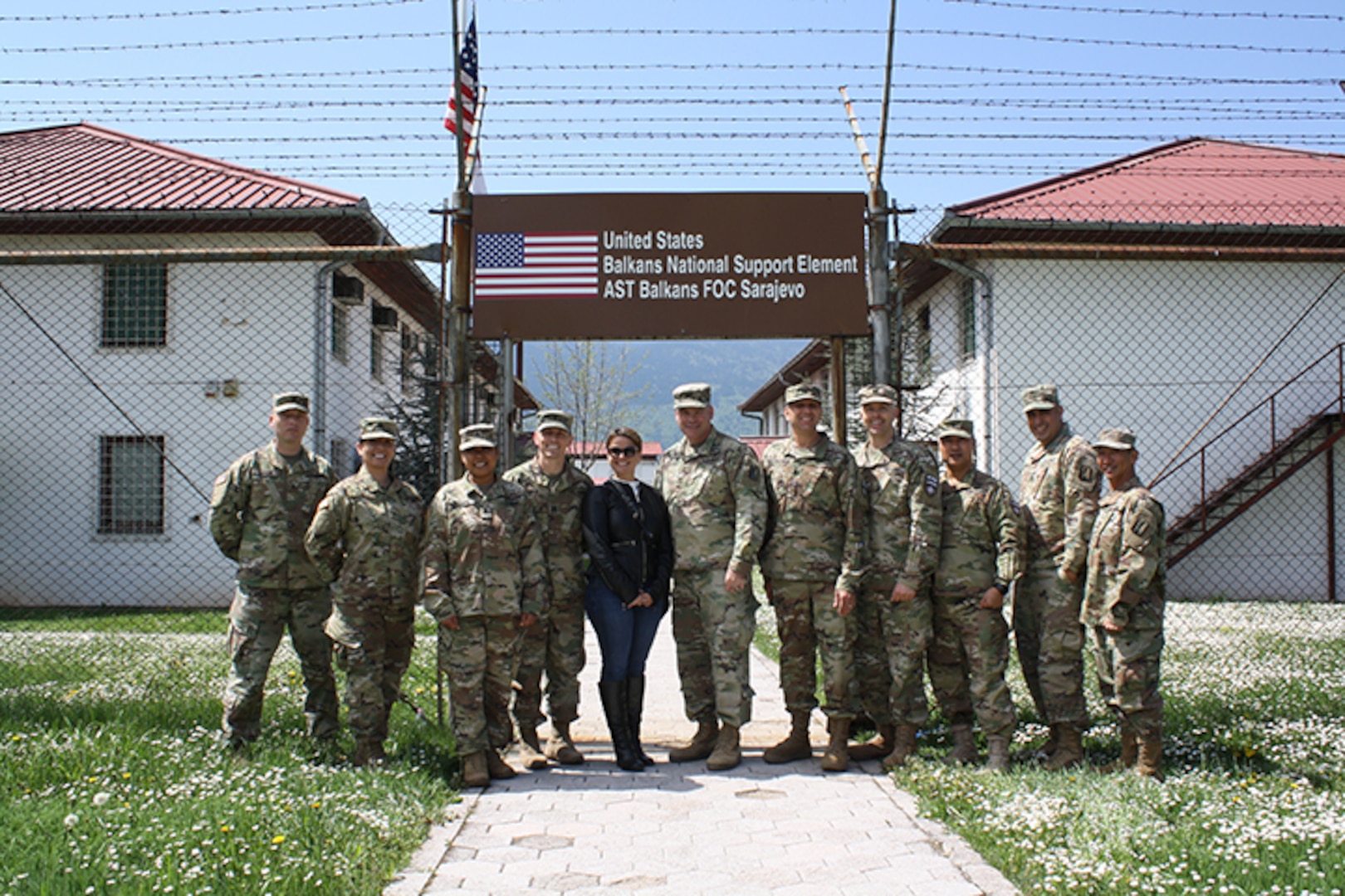 Multi-National Battle Group - East Cmdr. Col. Nick Ducich, members of his staff and Soldiers from NATO Headquarter -Sarajevo pose for a picture at Camp Butmir in Sarajevo, Bosnia and Herzegovina, April 24, 2018. Each Kosovo Force (KFOR) rotation provides Soldiers for NATO Headquarters- Sarajevo to oversee Camp Butmir, support the Bosnia and Herzegovina training mission, and provide essential services on the camp for the European Union Force Althea (EUFOR Althea) peacekeeping element.