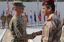 Maj. Gen. Walter Piatt, commander of Combined Joint Forces Land Component Command, shakes hands with Iraqi staff Lt. Gen. Abdul Amir al-Lami, deputy commander of Iraq Joint Operations Command, during the CJFLCC deactivation ceremony in Baghdad, Iraq, April 30, 2018. The deactivation signifies the end of major combat operations against ISIS in Iraq and acknowledges the changing composition and responsibilities of the Coalition.  (U.S. Army photo by Master Sgt. Horace Murray)