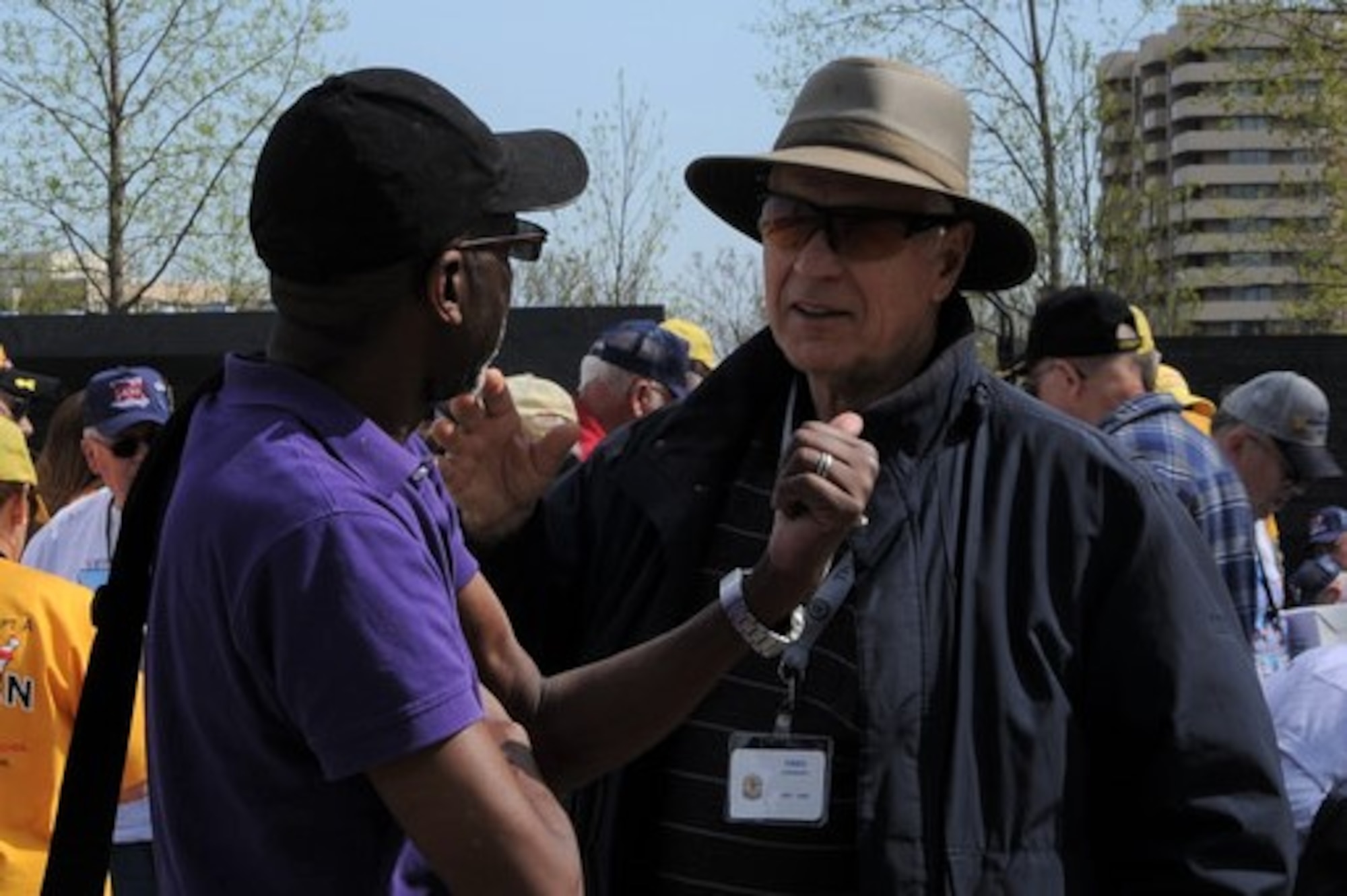 Ron McCreary, left, chats with a fellow member of The Berlin for Lunch Bunch at the Air Force Memorial April 21. The visit was part of a biennial reunion the group’s alumni and their families planned and organized.