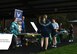 Vendors stand available to provide resource information during the Sexual Assault Prevention and Response Office’s Take Back the Night 5K at Joint Base Lewis-McChord, Wash., April 25, 2018. The purpose of the event was to raise awareness about sexual assault prevention. (U.S. Air Force photo by Senior Airman Tryphena Mayhugh)
