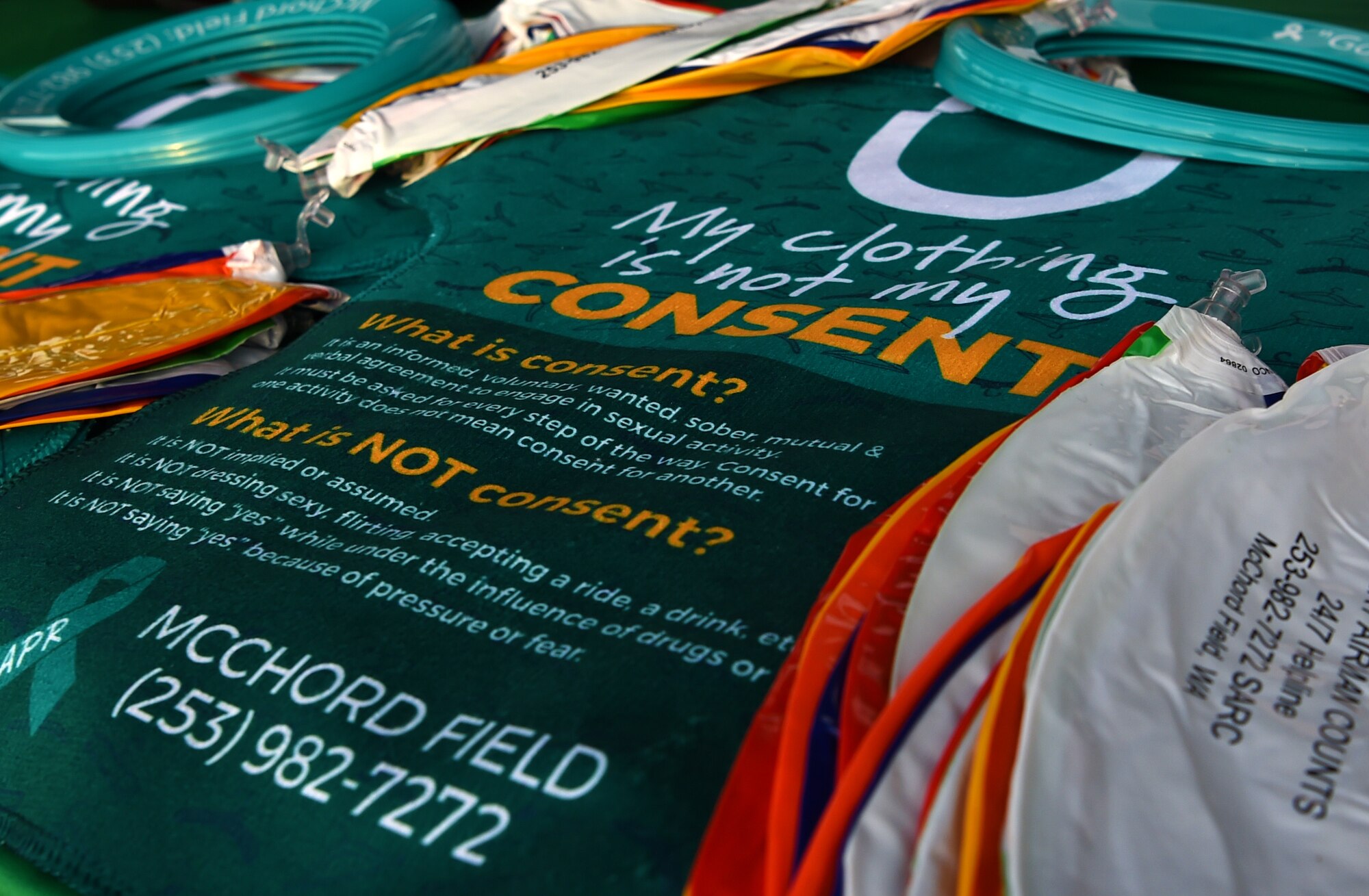 Sexual assault prevention and response (SAPR) items that help raise visibility and awareness were available during the SAPR Office’s Take Back the Night 5K walk/run at Joint Base Lewis-McChord, Wash., April 25, 2018. The 5K was held to raise awareness about sexual assault and ways to prevent it. (U.S. Air Force photo by Senior Airman Tryphena Mayhugh)
