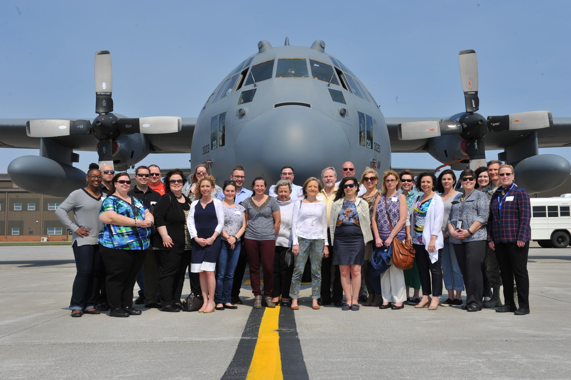 The Leadership Mahoning Valley (LMV) class of 2018 poses for a group photo in front of a Youngstown Air Reserve Station C-130H Hercules after a tour of the installation April 13, 2018.
