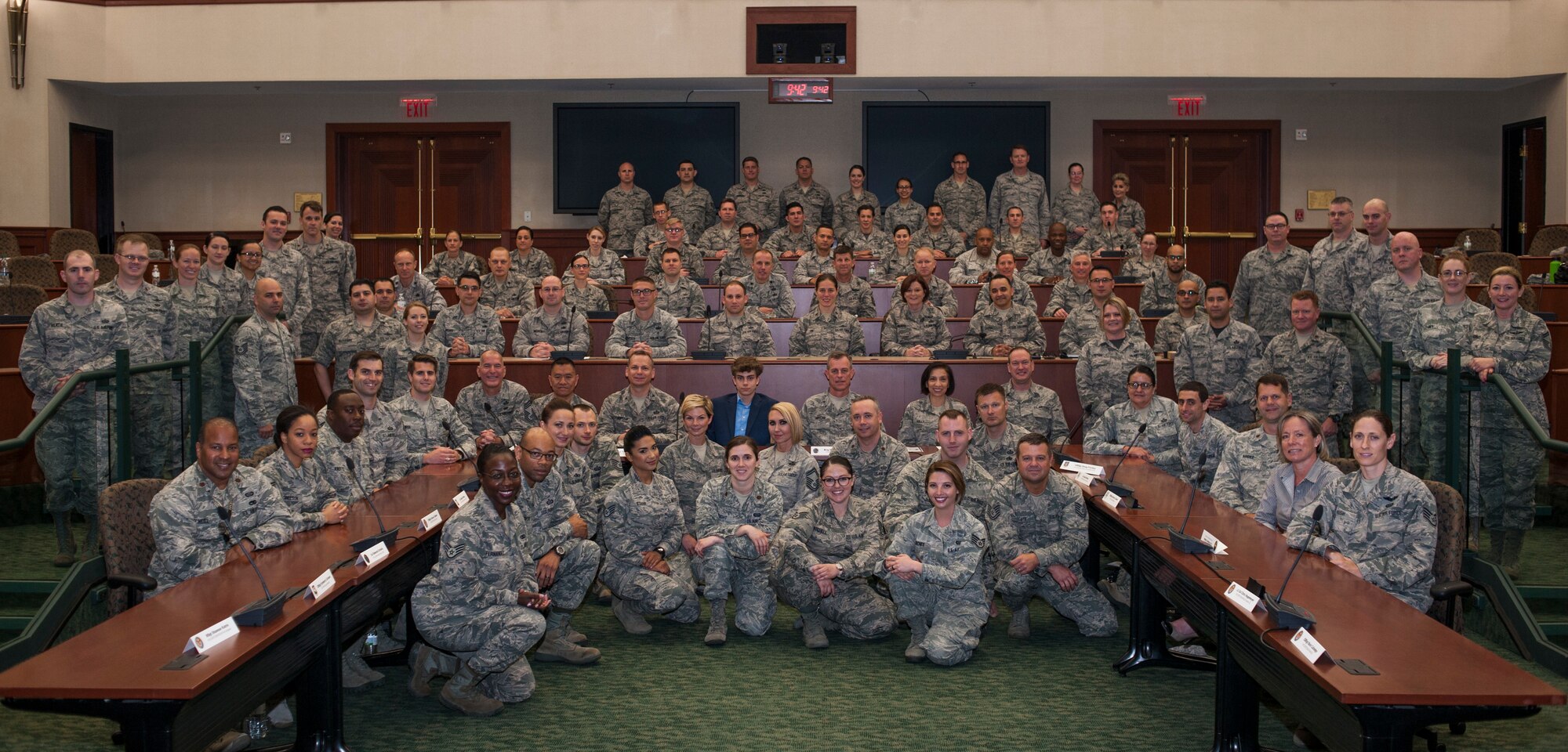 U.S. Air Force Individual Mobilization Augmentee (IMA) Airmen pause for a group photo during an Air Force IMA assembly hosted by U.S. Central Command at MacDill Air Force Base, Fla., April 27, 2018.