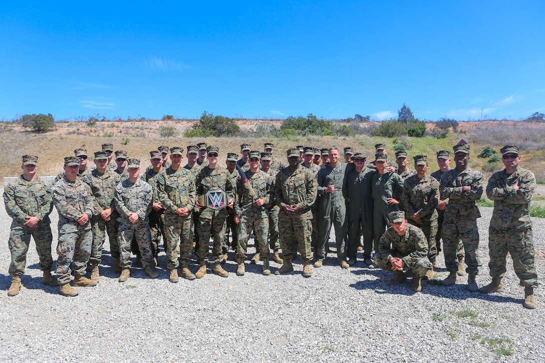 Marines with Headquarters and Headquarters Squadron (H&HS) pose after completing the “Warrior Challenge” at Marine Corps Air Station Miramar, Calif., April 26. The “Warrior Challenge” is a monthly competition between all of the sections in H&HS to promote camaraderie and a healthy competitive spirit. (U.S. Marine Corps photo by Cpl. Daniel Auvert/Released).