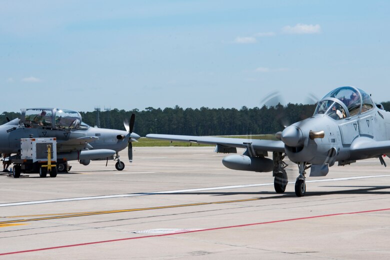 An A-29 Super Tucano taxis in, April 26, 2018, at Moody Air Force Base, Ga. The 81st Fighter Squadron received the aircraft to help continue the Afghan light air support training mission, which ultimately provides Afghan pilots with the capabilities of finding, tracking, and attacking targets either on their own or in support of ground forces. The aircraft will be used by the Afghan Air Force for close-air attack, air interdiction, escort and armed reconnaissance. (U.S. Air Force photo by Airman 1st Class Erick Requadt)