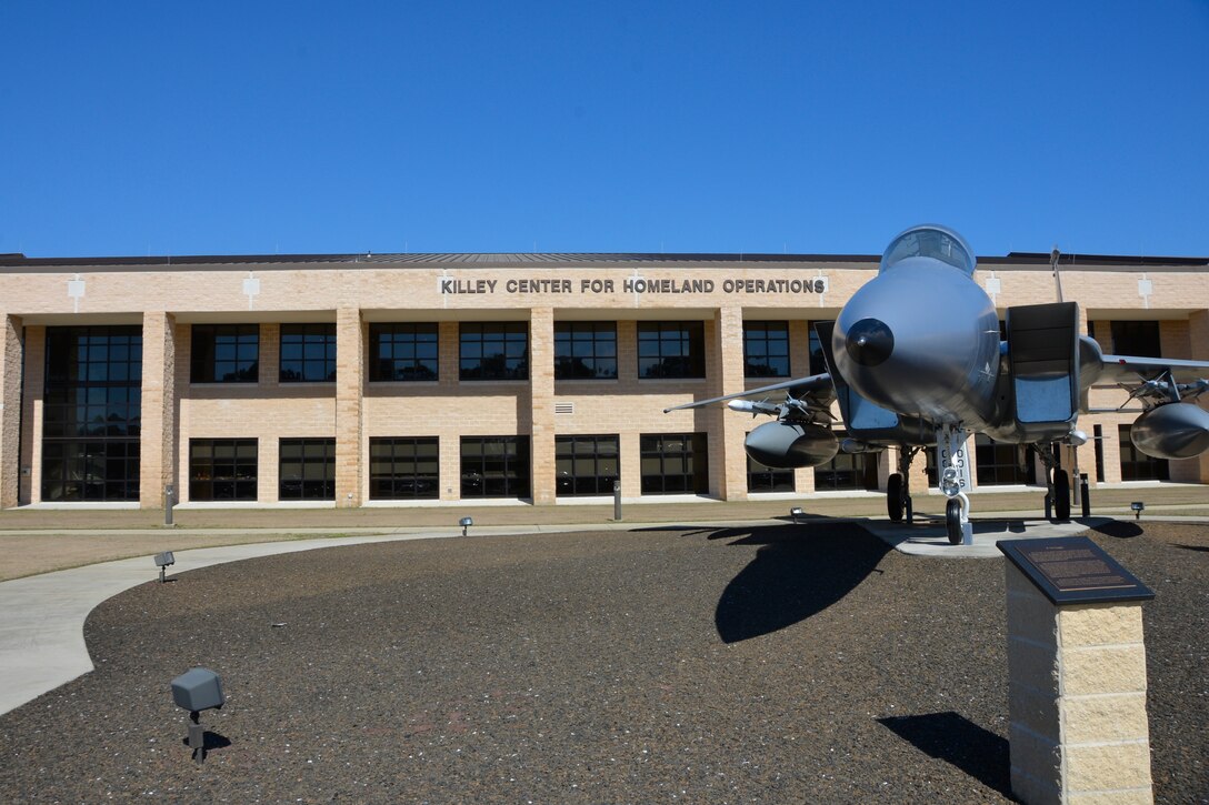 This F-15C in front of the Killey Center for Homeland Operations, 
Tyndall Air Force Base, Fla.,  symbolically represents the 102nd organization when it was a fighter wing at the time of the Sept. 11, 2001 terrorist attacks in New York City. (Air Force photo by Casey Connell)