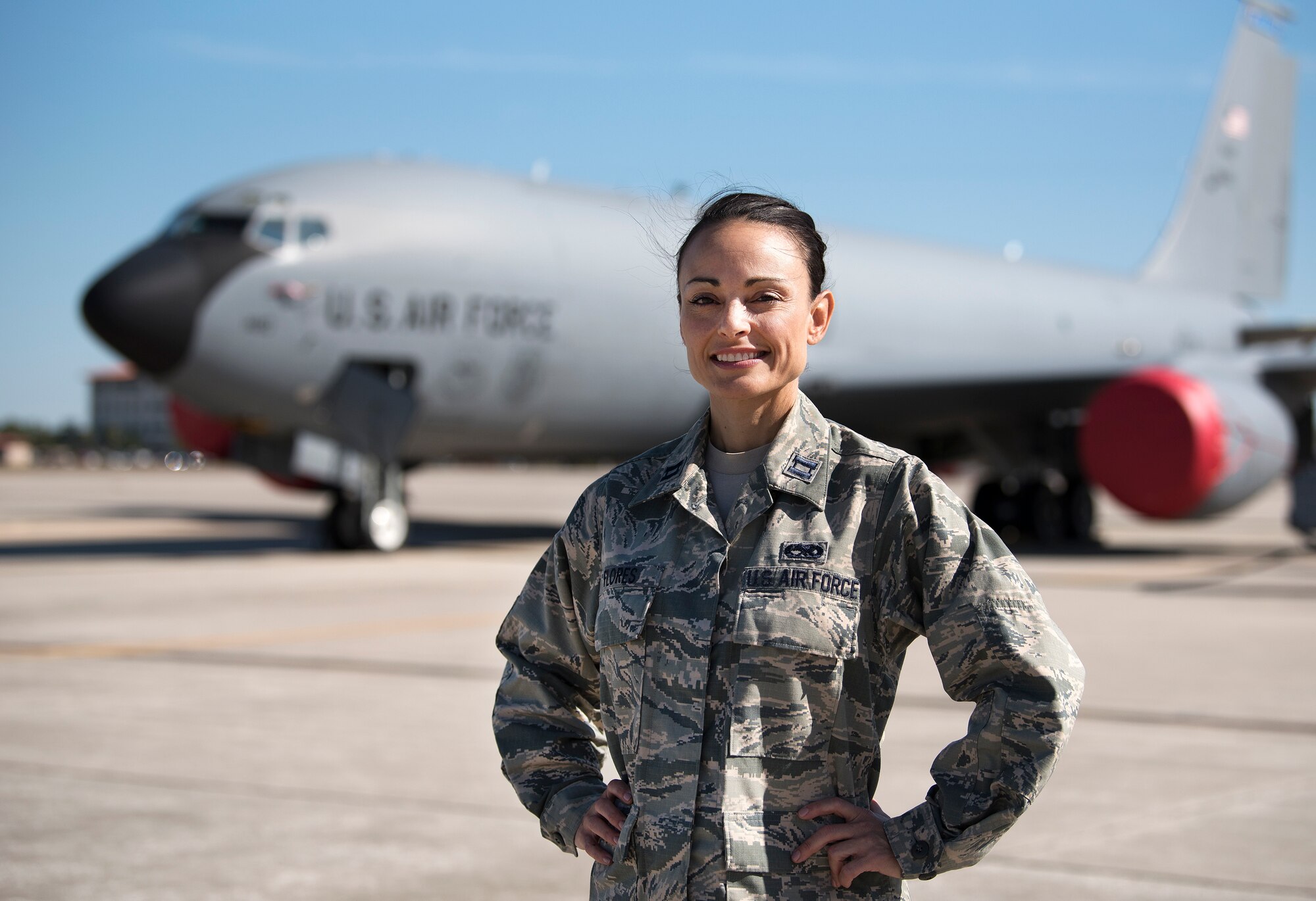 U.S. Air Force Capt. Kierstin Flores, an executive officer with the 6th Maintenance Group, pauses for a photo at MacDill Air Force Base, Fla., April 5, 2018. Flores began her career in the Air Force in 1997 as a pharmacy technician and commissioned as a maintenance officer 15 years later. While in the Air Force, she has completed two degrees, worked as a volunteer emergency responder, a police officer, an investigation analyst, a fitness competitor and is a dedicated mother. (U.S. Air Force photo by Airman 1st Class Ashley Perdue)