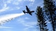 A C-130 Hercules aircraft equipped with a U.S. Department of Agriculture Forest Service Modular Airborne Fire Fighting System drops water over the Tahoe National Forest, California, April 26, 2018.