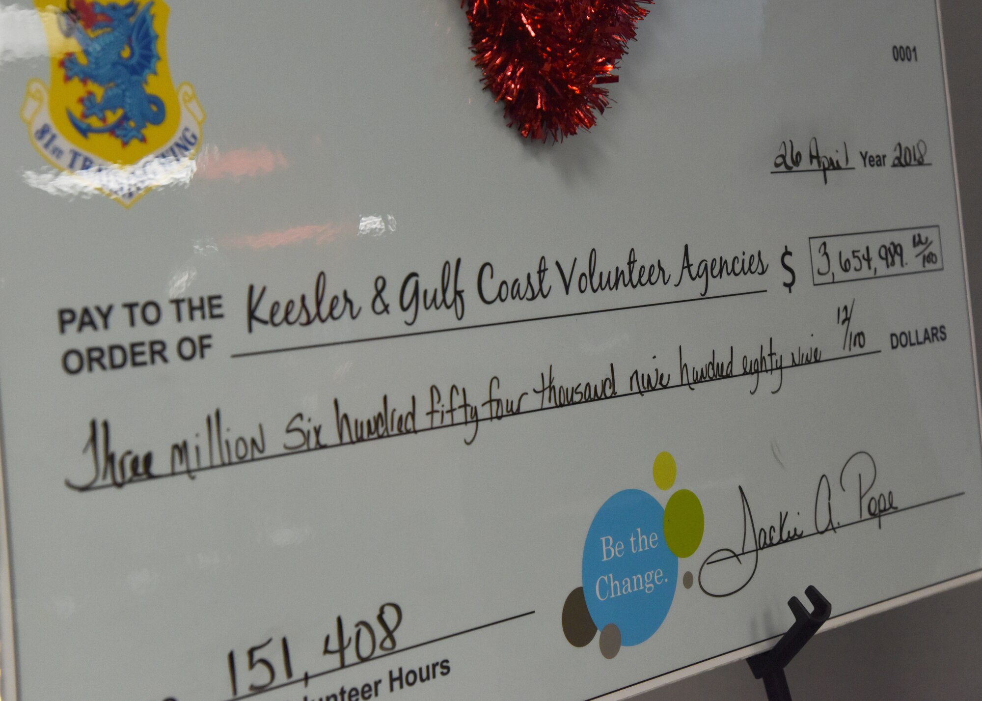 A check is on display during the 2018 Volunteer Appreciation Ceremony at the Sablich Center at Keesler Air Force Base, Mississippi, April 26, 2018. The event recognized Keesler personnel, family members and retirees for their volunteer service in 2017. Keesler personnel donated more than 150,000 volunteer hours equaling $3,654,989.12. (U.S. Air Force photo by Kemberly Groue)